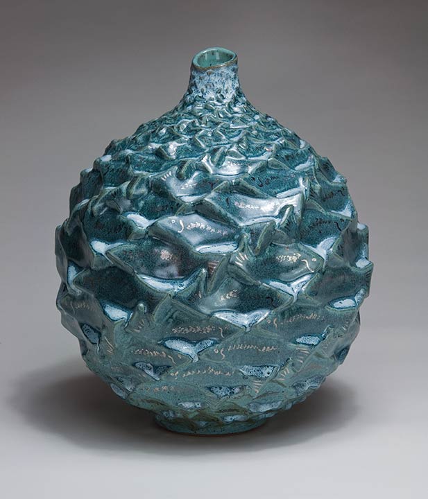Textured blue ceramic pot