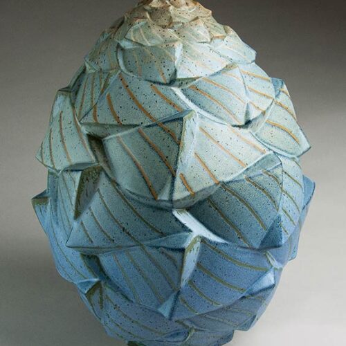 Bulwark - Faceted texture in blue, green, and orange ceramic pot