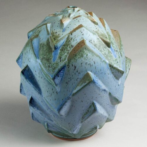 Silent Cliffs - Faceted texture in blue, green, and orange ceramic pot